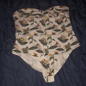 Large forever 21 Floral printed white jumpsuit.